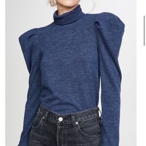 Blue sweater with shoulder pads